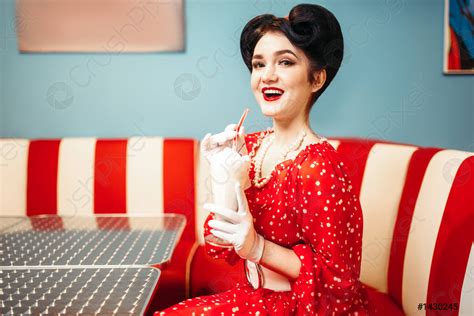 Sexy Pin Up Girl Drinks Milkshake Through A Straw Stock Photo 1430245