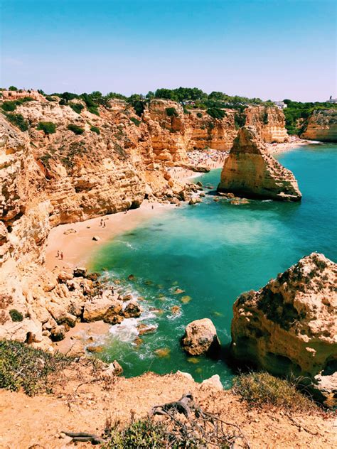 Why should i visit portugal? Lagos Portugal Travel Guide - Grilled Cheese Social