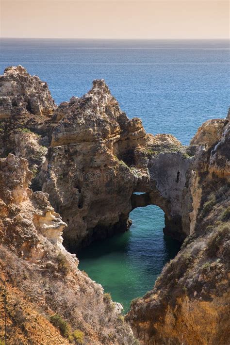 Coast With Cliffs In Lagos At Algarve In Portugal Stock Image Image