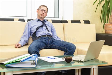 Tired Boss Businessman After Hard Work Leaned Back On The Back Of The Sofa Hard Work Stock