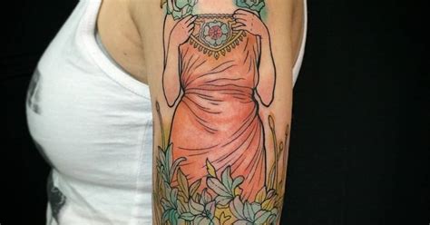 Alfons Mucha Inspired Tattoo On The Left Upper Arm