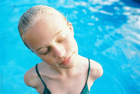 Blonde Teen With Short Wet Hair Portrait In Swimming Pool By Wendy Laurel