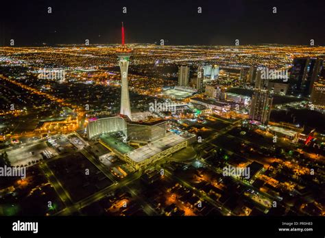 View Of Las Vegas And Stratosphere Tower From Helicopter At Night Las