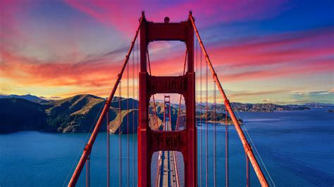 Golden Gate Bridge At Sunset By Cameron Venti