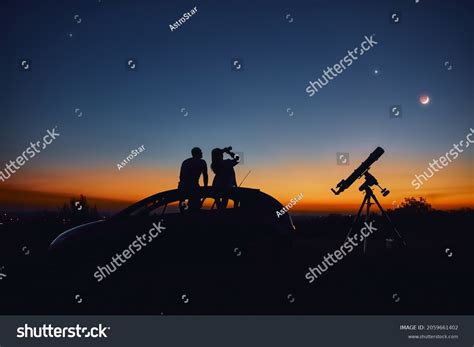 Couple Stargazing Together Astronomical Telescope Stock Photo