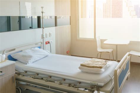 Modern Hospital Room With Bed And Medical Equipment Ncha