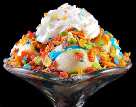 Fruity Pebbles Sundae Vanilla Bean Ice Cream Topped With A Blue Icing