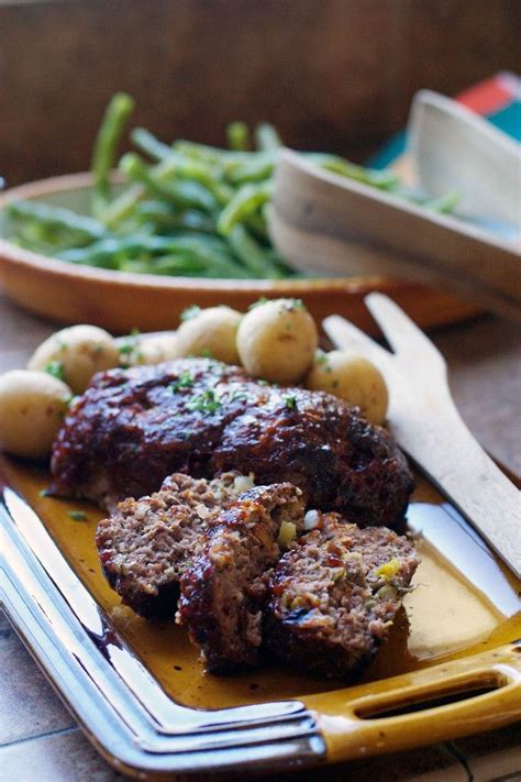 In a bowl, stir together the ketchup and brown sugar; Classic Meatloaf | Eat Simple Food | Meatloaf recipes easy ...