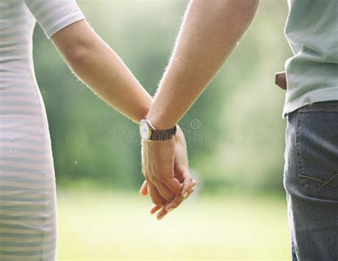 Two Lovers Holding Hands Gently Together Stock Image Image Of Part