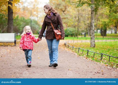 Mother And Daughter Walking In Autumn Park Stock Image Image Of Adorable Outdoors 27097285
