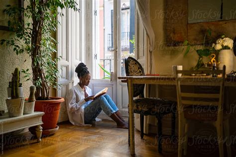 Black Woman At Home By Stocksy Contributor Luis Velasco Stocksy