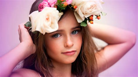 Cute Girl Is Having Flowers Crown On Head Facing One Side In A Pink Background 4k Hd Cute
