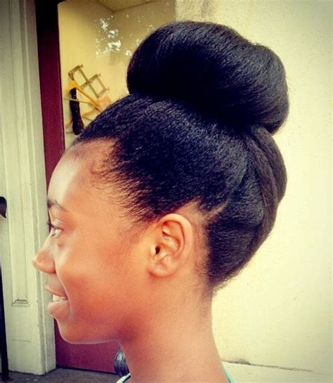 Gone are the days where black women feel that it's necessary to straighten their hair with chemicals or a pressing comb just to deal with it. 50 Cute Updos for Natural Hair
