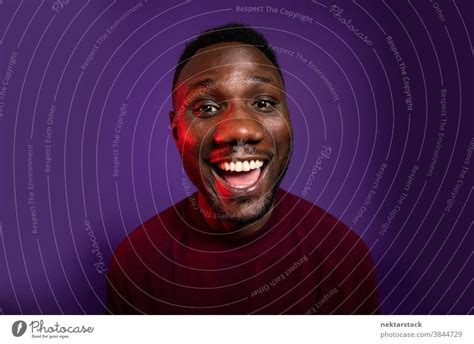 African Man Smiling With Big Smile At Camera A Royalty Free Stock