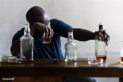 Download Premium Image Of African American Man Drinking Alcohol 48719