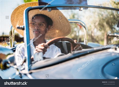 Black Woman Driving Vintage Convertible Car Stock Photo 1234488784