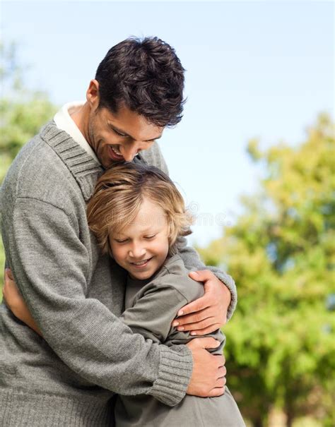 Son Embracing His Father Stock Image Image Of Camera 18740461