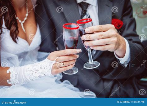 Hands Of Bride And Groom Clink Glasses With Champagne Stock Image Image Of Enjoy Celebration