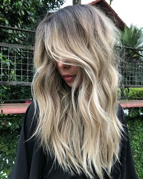 For a casual look, make a lovely combination of brown and blonde shades. Rooty Beige-Blonde Balayage for Thick Wavy Dark-Blonde ...