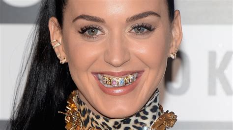 Why You Should Think Twice Before Getting A Tooth Gem Or Grills