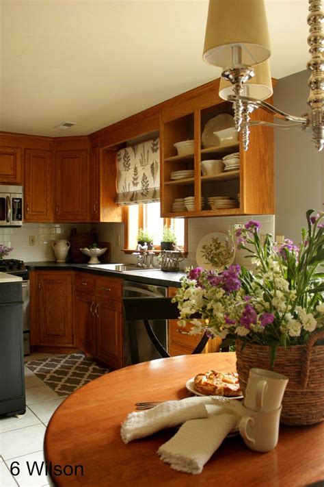 Kitchen color ideas with oak cabinets corner design. Love this "in between" update! My style and she has the ...