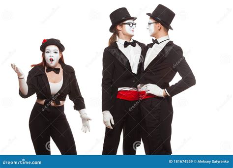Portrait Of Three Mime Artists Performing Isolated On White Background