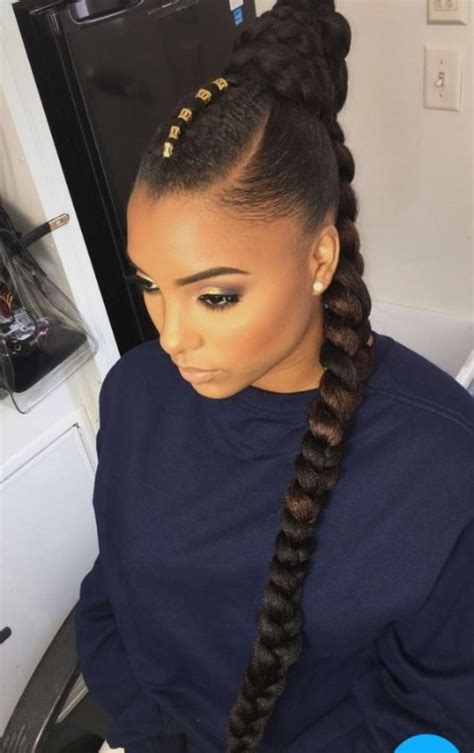 Silk and sooth hairstyle, styled in layered cut from front side and covering some area of face makes the beauty of black brides impressive and cool. 60+ Stunning Ponytail Hairstyles for Black Women | New Natural Hairstyles