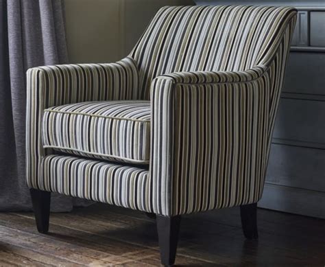 Incorporating flared edges into furniture is an effortless way to refresh timeless pieces with. Golding Silver Striped Fabric Arm Chair