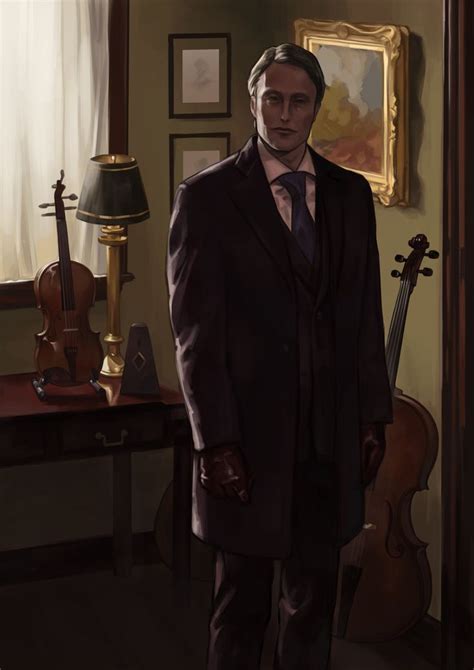 A Man In A Suit And Tie Standing Next To A Table With A Violin On It