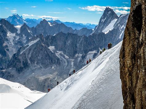 A Group Of Climbers Is Trying To Reach The Peak Of Mont Blanc France