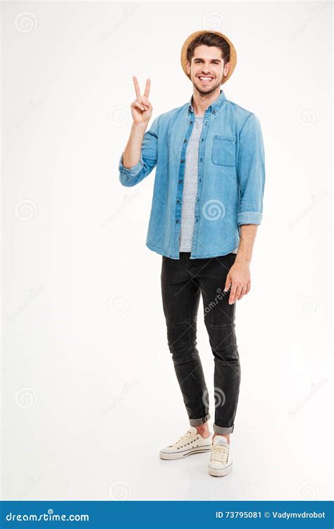 full length of smiling man standing and showing peace sign stock image image of cute fashion