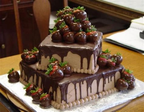 A tall cake is usually just a cake whose height has been extended. 2 tier square chocolate cake with chocolate dipped ...