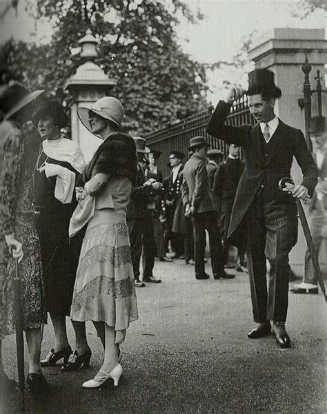 а Gentleman Tips His Hat To A Group Of Ladies In The 1920s