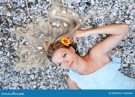 girl on the pebbles near the sea stock image image of brown cute 29956763