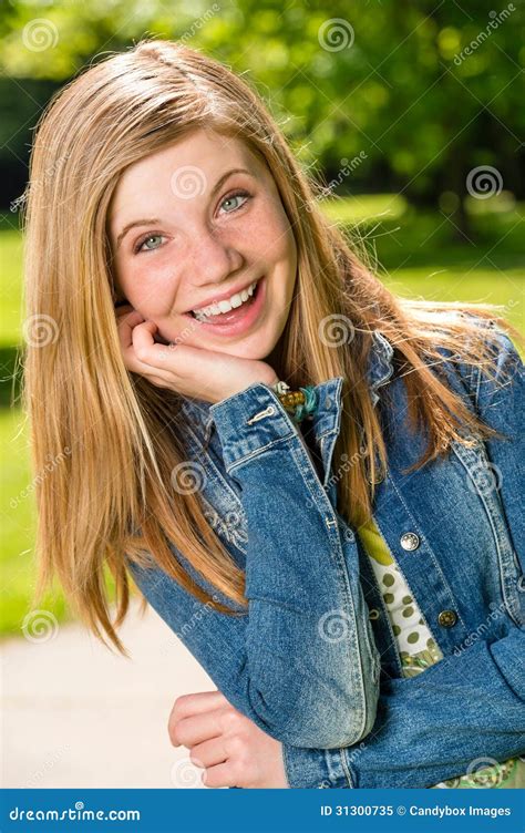 Portrait Of Smiling Teenage Girl Outside Stock Image Image Of