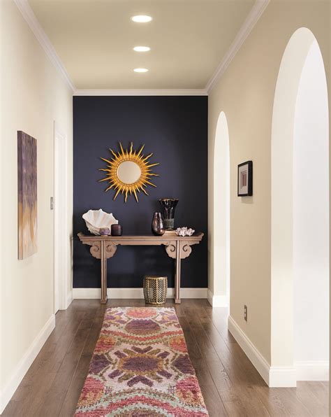 A Dark Accent Wall Makes A Stunning Statement At The End Of A Hallway