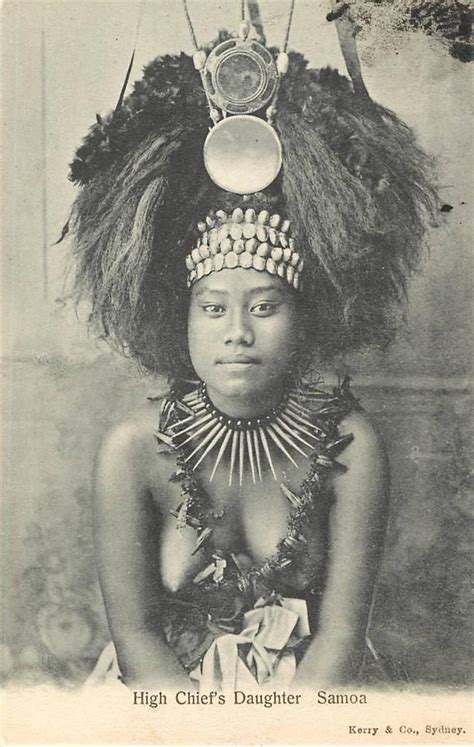 An Old Black And White Photo Of A Woman Wearing A Headdress With