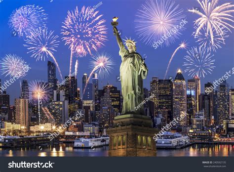 Manhattan Skyline The Statue Of Liberty Fireworks At Night New York