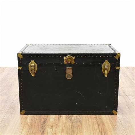 This Large Steamer Trunk Is Featured In A Solid Wood With A Distressed