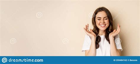 Close Up Portrait Of Enthusiastic Young Woman Rejoicing Shouting With