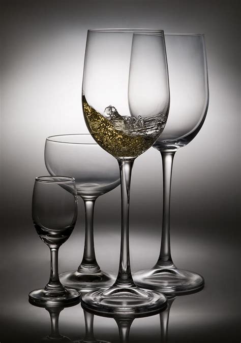 Splashing Wine In Wine Glasses Photograph By Setsiri Silapasuwanchai