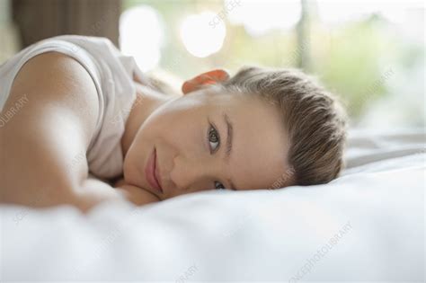 Smiling Girl Laying On Bed Stock Image F0137530 Science Photo