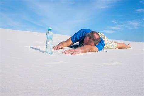 Tired Man Suffering From Thirst Lost In The Desert Stock Photo Image