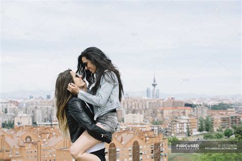 Attractive Lesbian Couple Together Candid Stock Photo