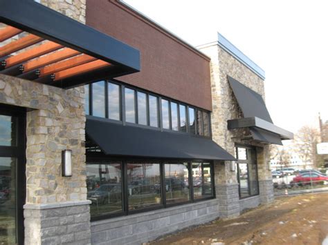Storefront awning with graphics in stone harbor, nj. Storefront facade awnings - Bala Cynwyd | Kreider's Canvas ...