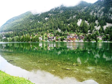 Switzerland - Alps lake reflection | Switzerland alps, Lake reflection, Switzerland