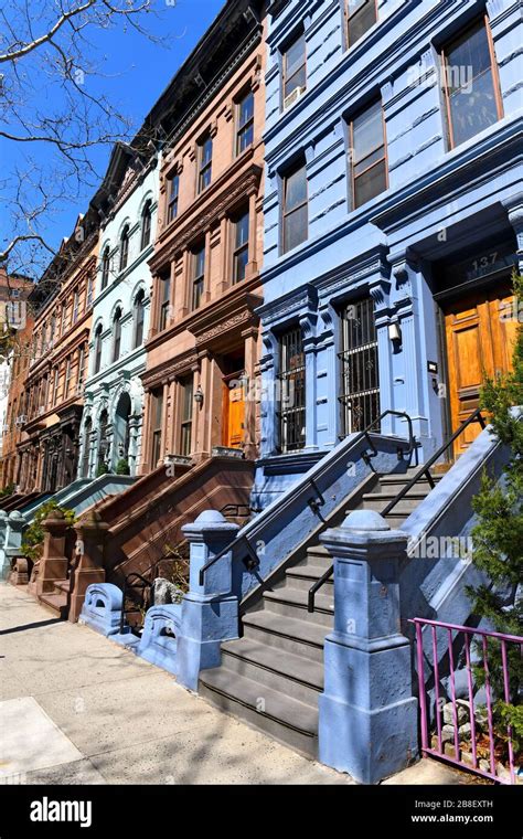 Exterior Facade Of Colorful Brownstone Apartment Buildings Upper West
