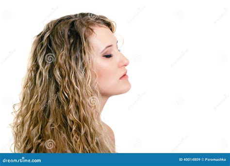 Portrait Of A Beautiful Young Girl With Long Blond Wavy Hair Stock