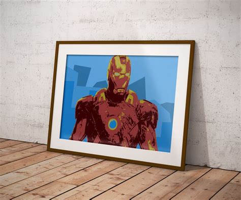 An Iron Man Poster Hanging On The Wall Next To A Wooden Floor In Front