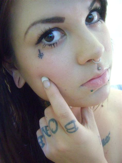 Simple Small Cross Tattoos On Face